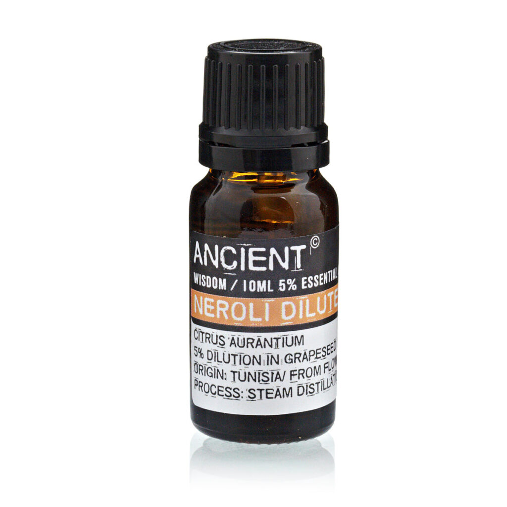 Amber glass essential oil bottle with black cap, labeled Neroli Dilute from Ancient Wisdom (10 mL, 5% essential oil).