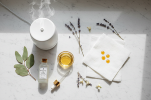 Essential oil bottles with diffuser and roller — hero image for Essential Oils 101: Diffusing vs Topical vs Inhalation