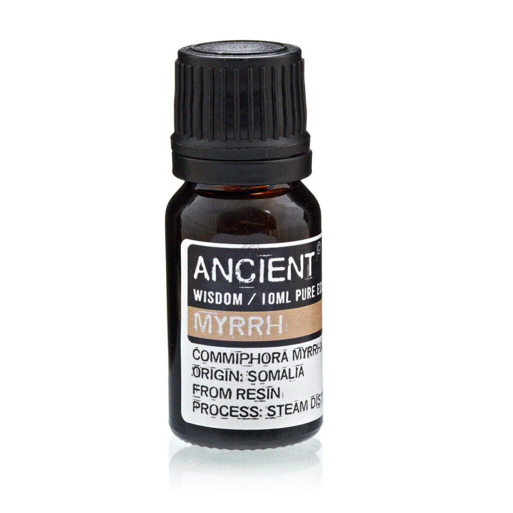 Amber glass bottle with a black cap labeled ‘Ancient Wisdom / Myrrh’ essential oil from resin distillation from Somalia (steam distillation)