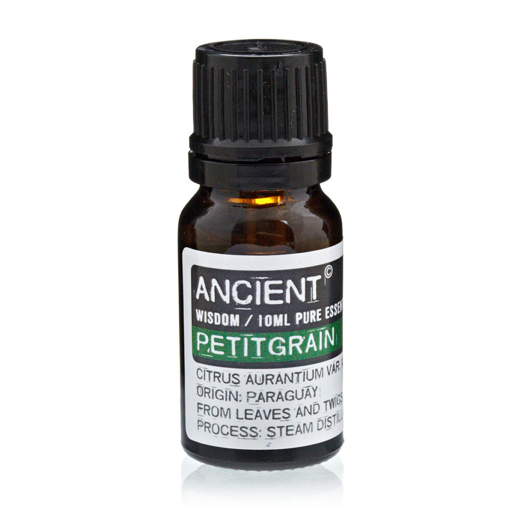 Amber glass essential oil bottle with a black ribbed cap, labeled 'Ancient Wisdom Petitgrain' (Citrus aurantium)